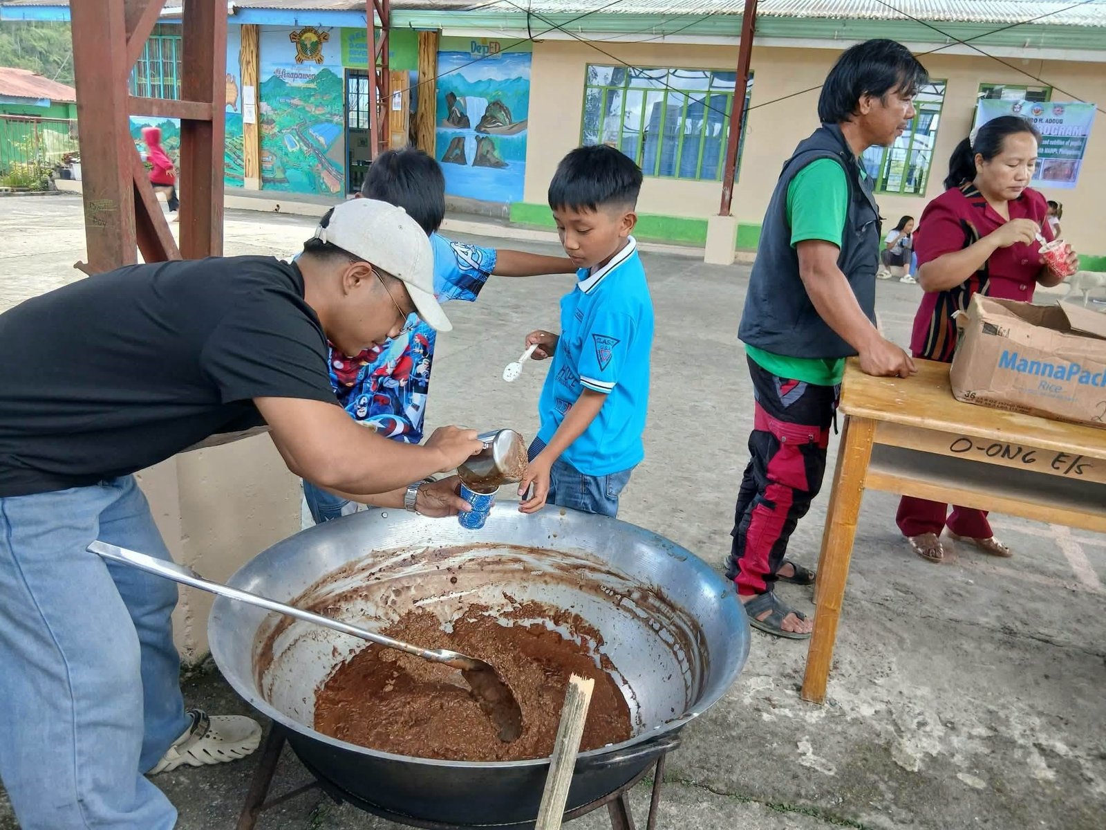 Feeding for the pupils of O-ong Elementary School.